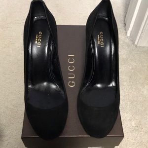 Gucci black suede pumps.